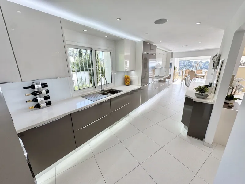 New Listing - Lovely 5 bed, 3.5 bath Villa on elevated plot in Upper Calahonda, offering beautiful panoramic views over tree-lined hillside down to the sea.