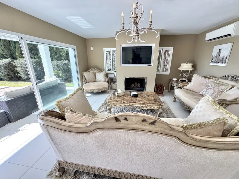 New Listing - Lovely 5 bed, 3.5 bath Villa on elevated plot in Upper Calahonda, offering beautiful panoramic views over tree-lined hillside down to the sea.