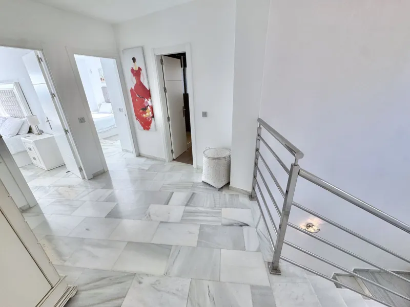 New Listing - Lovely 5 bed, 3.5 bath Villa on elevated plot in Upper Calahonda, offering beautiful panoramic views over tree-lined hillside down to the sea.