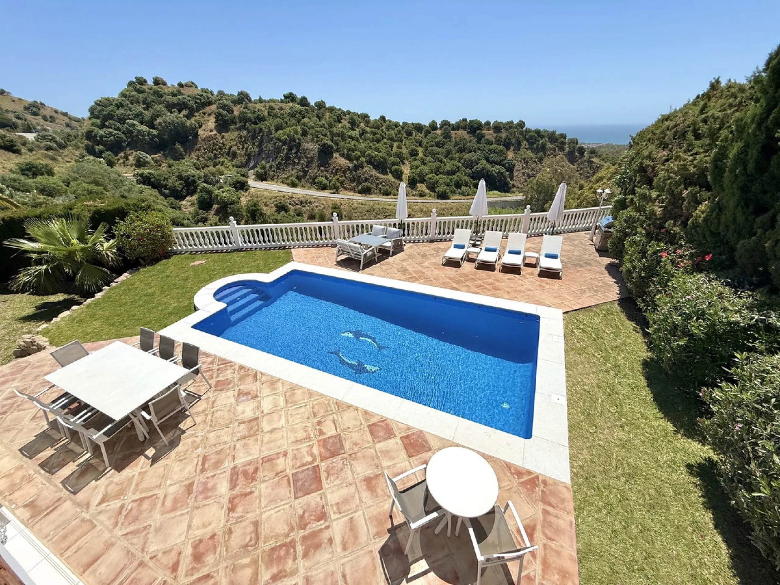 New Listing - Lovely 5 bed, 3.5 bath Villa on elevated plot in Upper Calahonda, offering beautiful panoramic views over tree-lined hillside down to the sea.