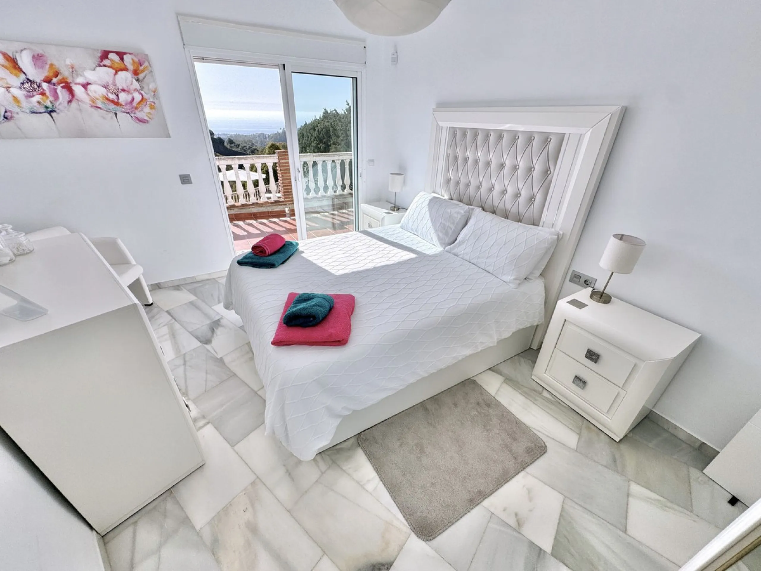 New Listing - Lovely 5 bed, 3.5 bath Villa on elevated plot in Upper Calahonda, offering beautiful panoramic views over tree-lined hillside down to the sea.