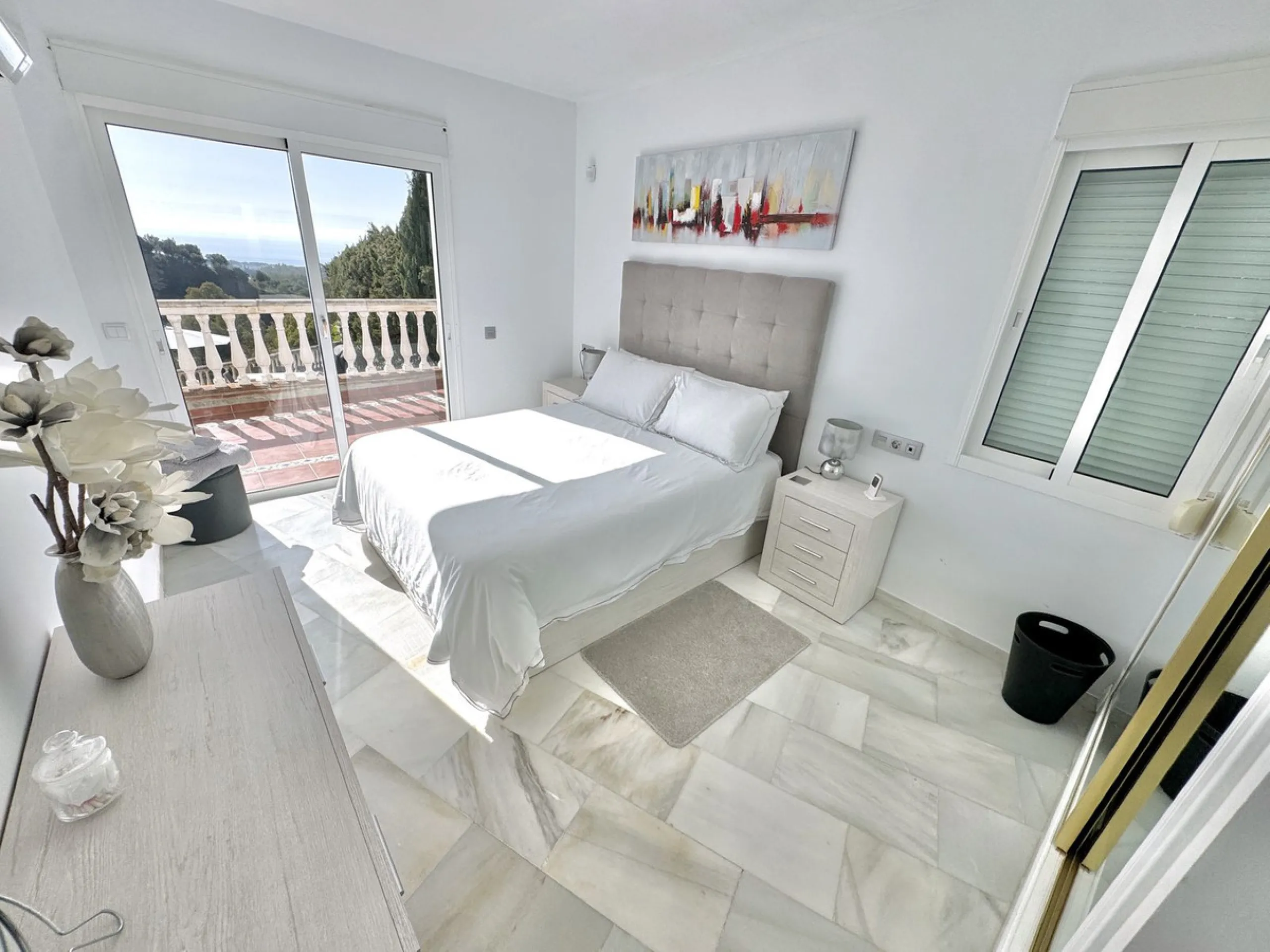 New Listing - Lovely 5 bed, 3.5 bath Villa on elevated plot in Upper Calahonda, offering beautiful panoramic views over tree-lined hillside down to the sea.