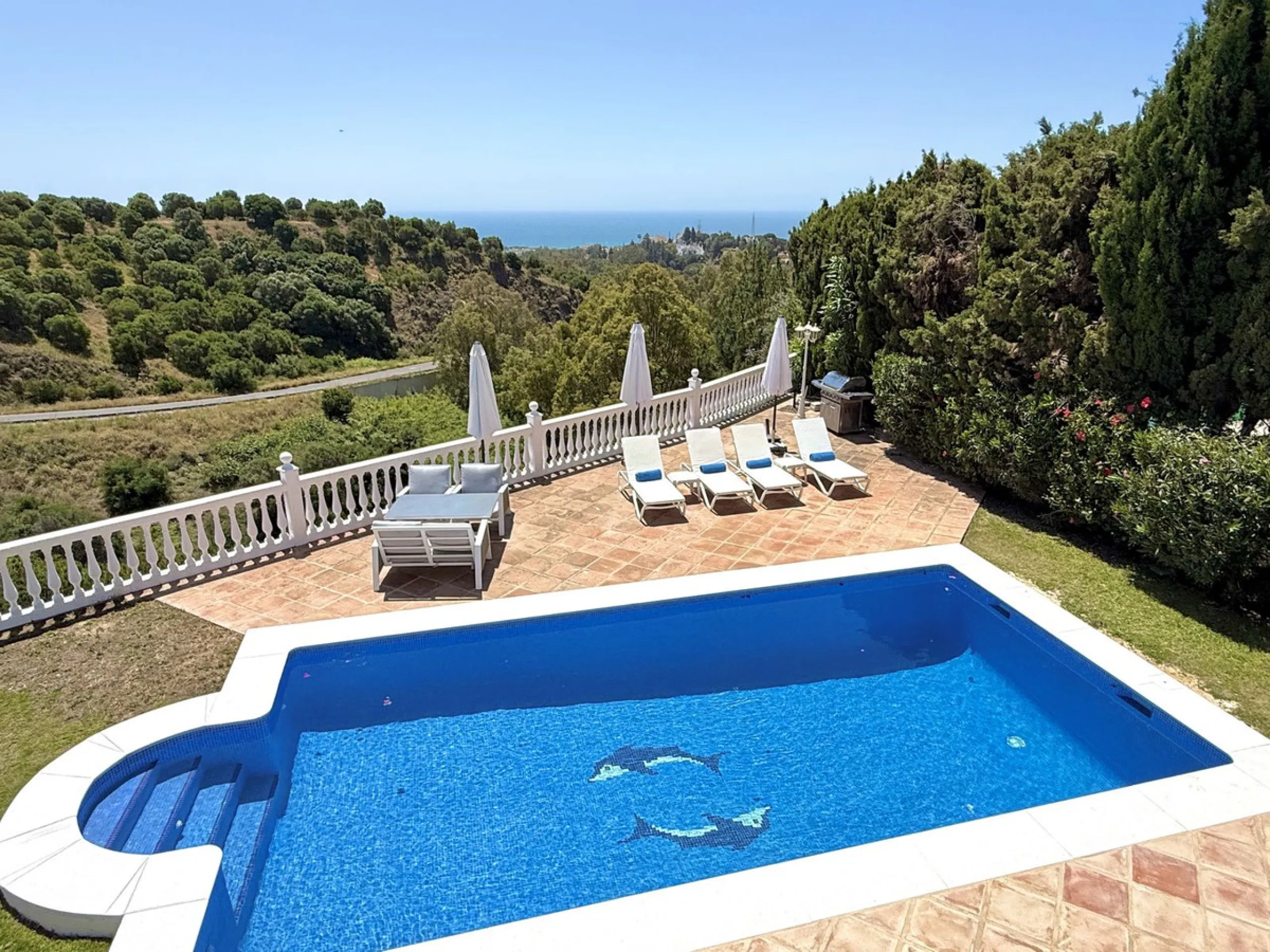 New Listing - Lovely 5 bed, 3.5 bath Villa on elevated plot in Upper Calahonda, offering beautiful panoramic views over tree-lined hillside down to the sea.