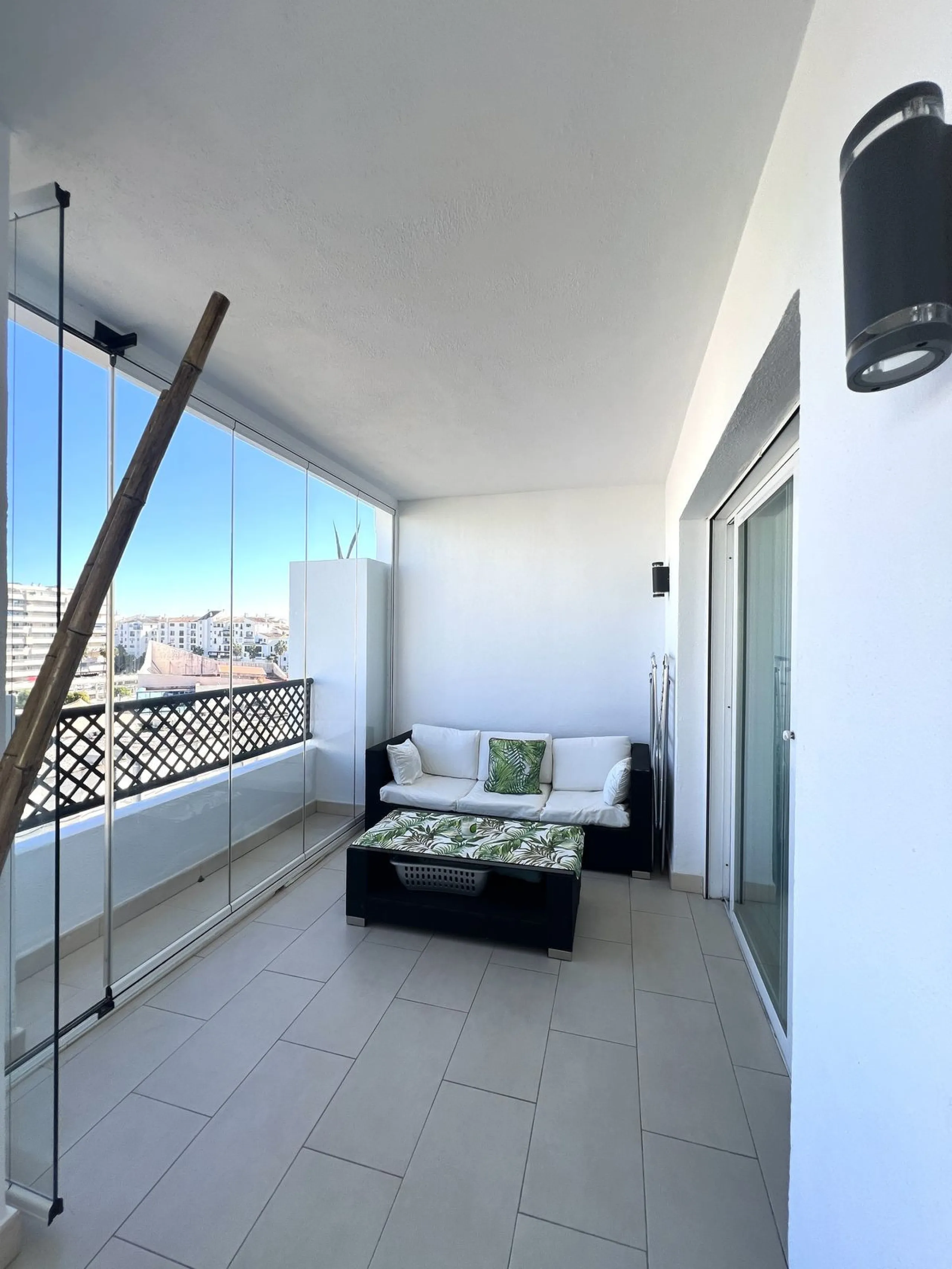 Introducing a beautifully upgraded 2-bedroom, 2-bathroom residence in the exclusive Terrazas de Banús, one of Puerto Banús' most sought-after complexes. Offering 24-hour concierge service, pristine subtropical gardens, and two serene swimming pools, this 