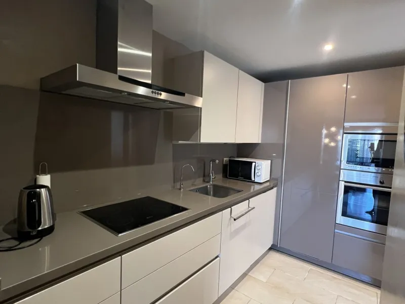 Introducing a beautifully upgraded 2-bedroom, 2-bathroom residence in the exclusive Terrazas de Banús, one of Puerto Banús' most sought-after complexes. Offering 24-hour concierge service, pristine subtropical gardens, and two serene swimming pools, this 