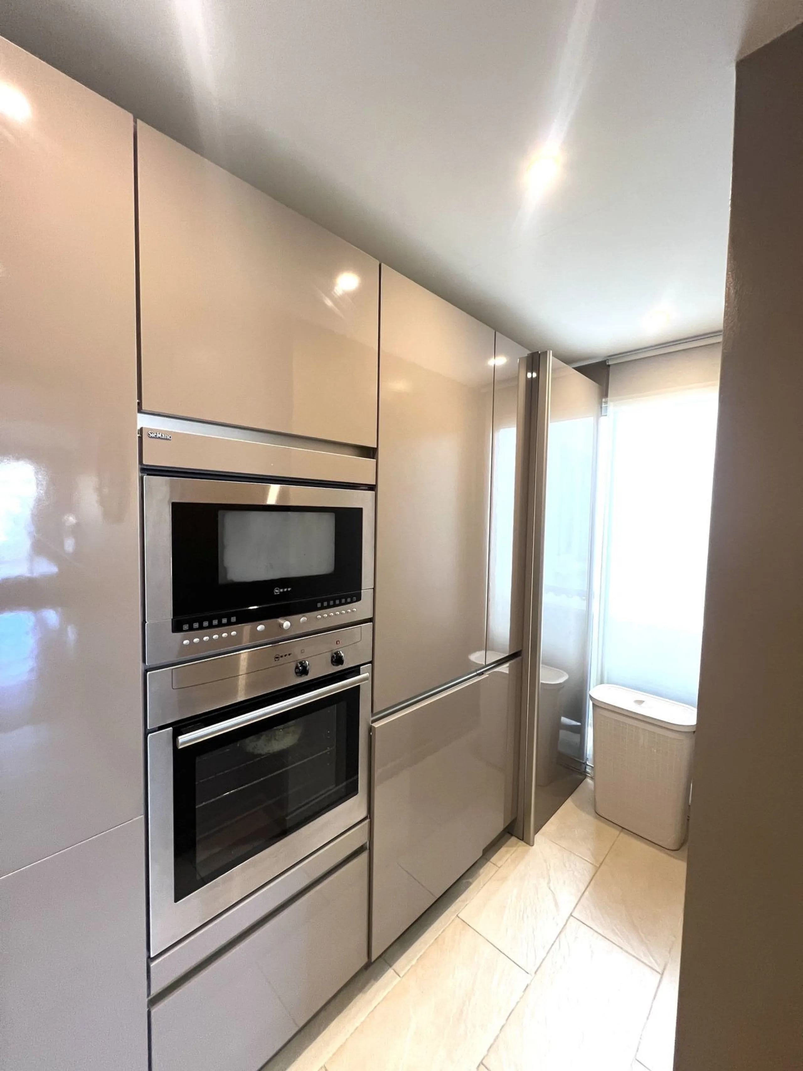 Introducing a beautifully upgraded 2-bedroom, 2-bathroom residence in the exclusive Terrazas de Banús, one of Puerto Banús' most sought-after complexes. Offering 24-hour concierge service, pristine subtropical gardens, and two serene swimming pools, this 