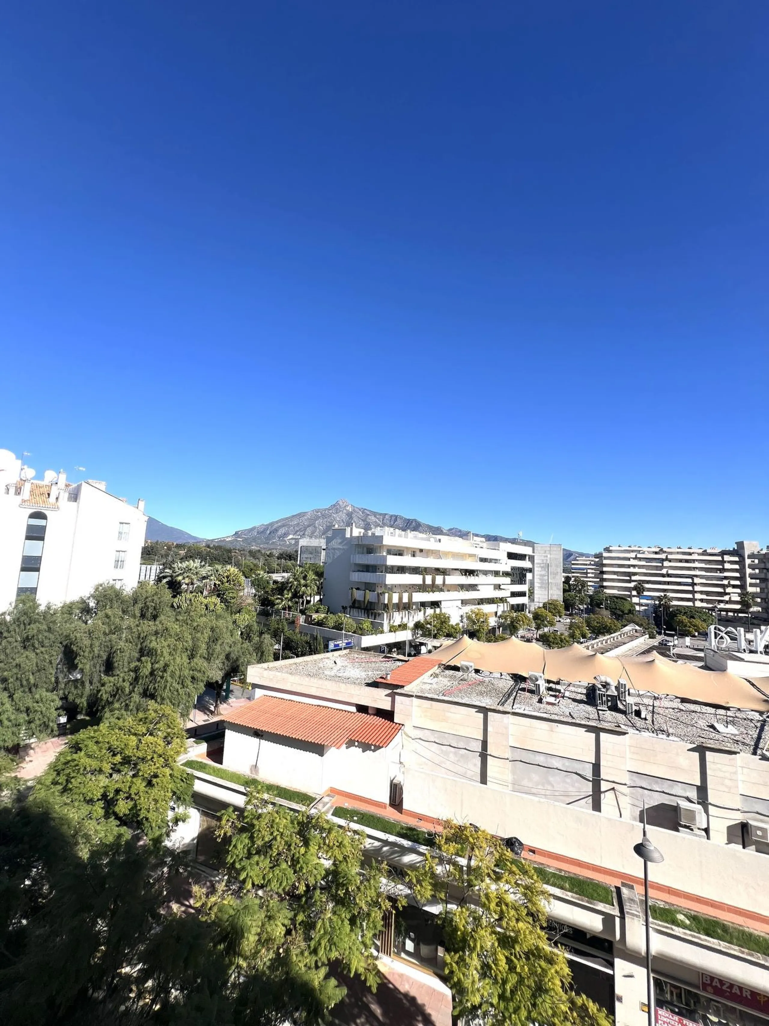 Introducing a beautifully upgraded 2-bedroom, 2-bathroom residence in the exclusive Terrazas de Banús, one of Puerto Banús' most sought-after complexes. Offering 24-hour concierge service, pristine subtropical gardens, and two serene swimming pools, this 