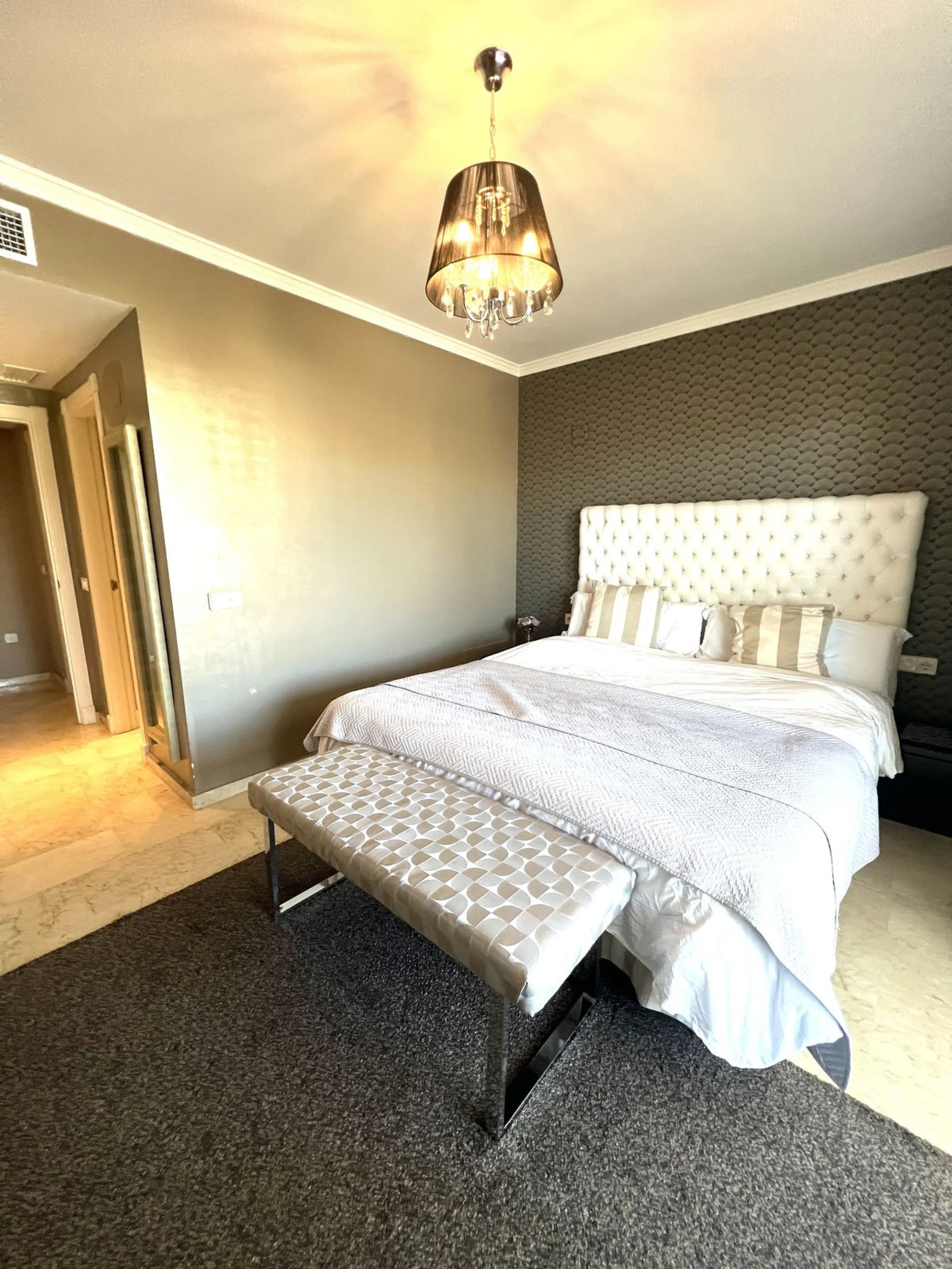 Introducing a beautifully upgraded 2-bedroom, 2-bathroom residence in the exclusive Terrazas de Banús, one of Puerto Banús' most sought-after complexes. Offering 24-hour concierge service, pristine subtropical gardens, and two serene swimming pools, this 