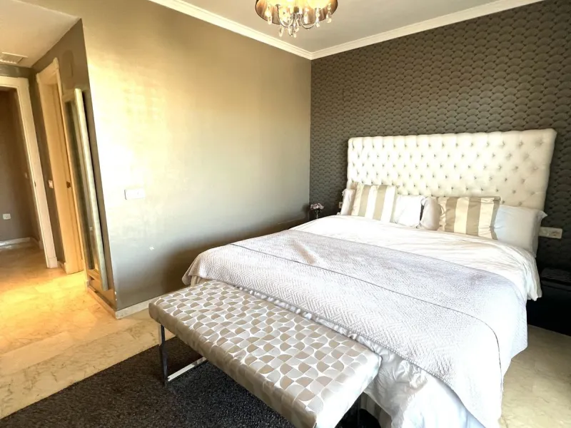 Introducing a beautifully upgraded 2-bedroom, 2-bathroom residence in the exclusive Terrazas de Banús, one of Puerto Banús' most sought-after complexes. Offering 24-hour concierge service, pristine subtropical gardens, and two serene swimming pools, this 