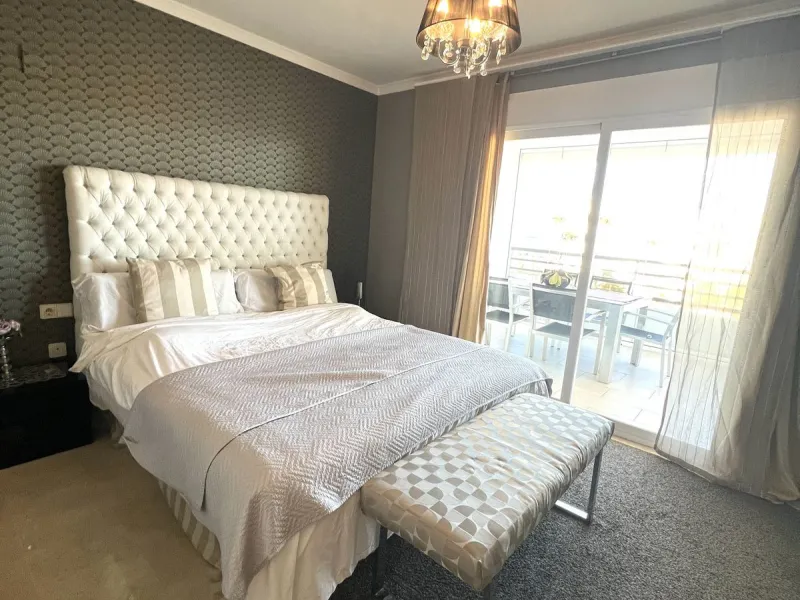 Introducing a beautifully upgraded 2-bedroom, 2-bathroom residence in the exclusive Terrazas de Banús, one of Puerto Banús' most sought-after complexes. Offering 24-hour concierge service, pristine subtropical gardens, and two serene swimming pools, this 