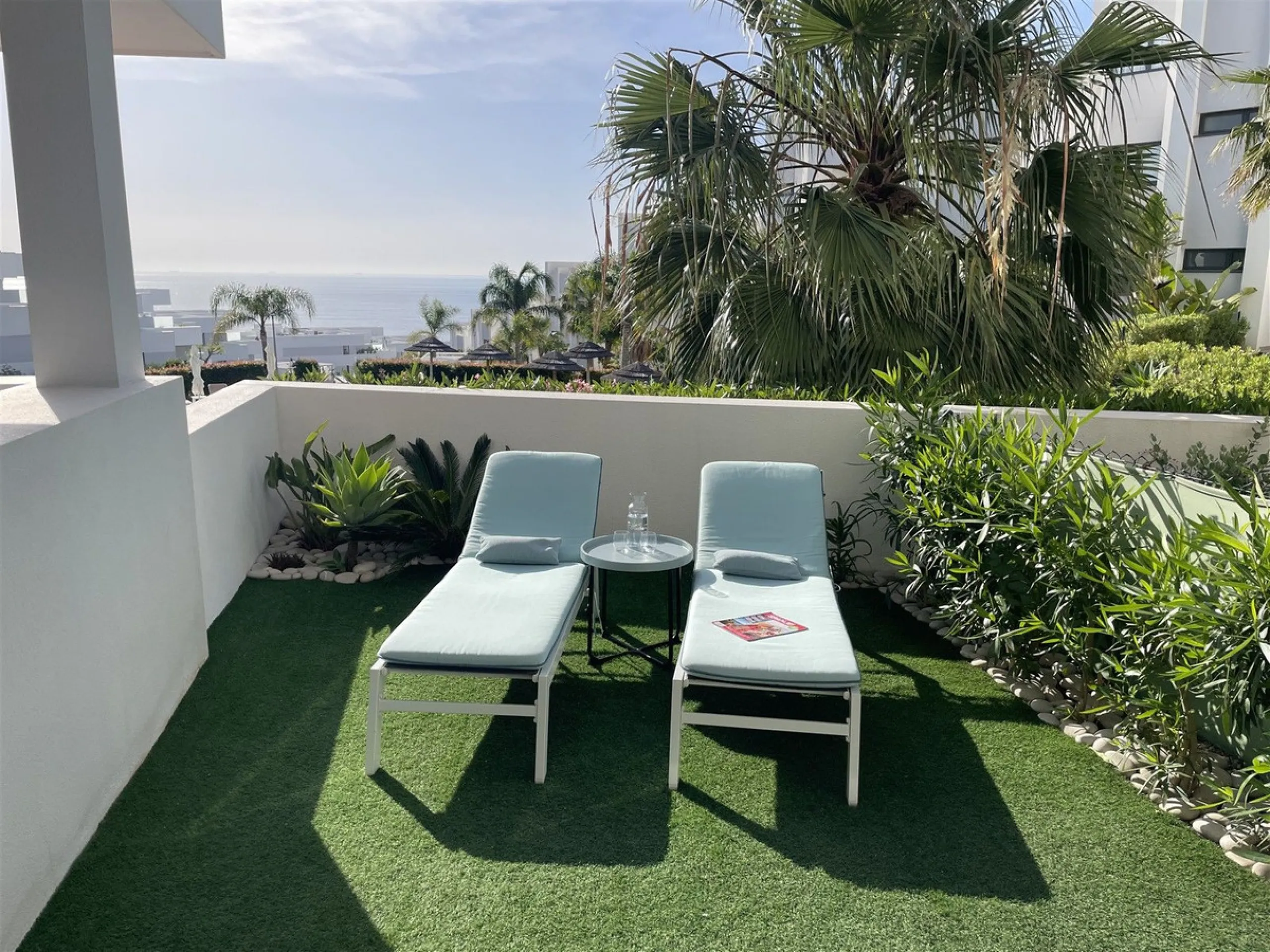 Beautiful 2 Bedroom elevated ground floor apartment with spacious terrace and sea views.