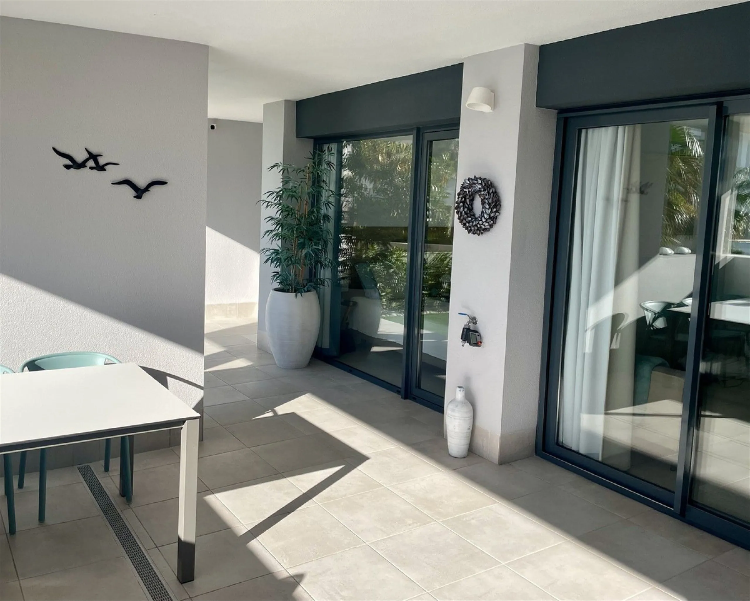 Beautiful 2 Bedroom elevated ground floor apartment with spacious terrace and sea views.