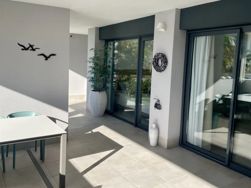 Beautiful 2 Bedroom elevated ground floor apartment with spacious terrace and sea views.
