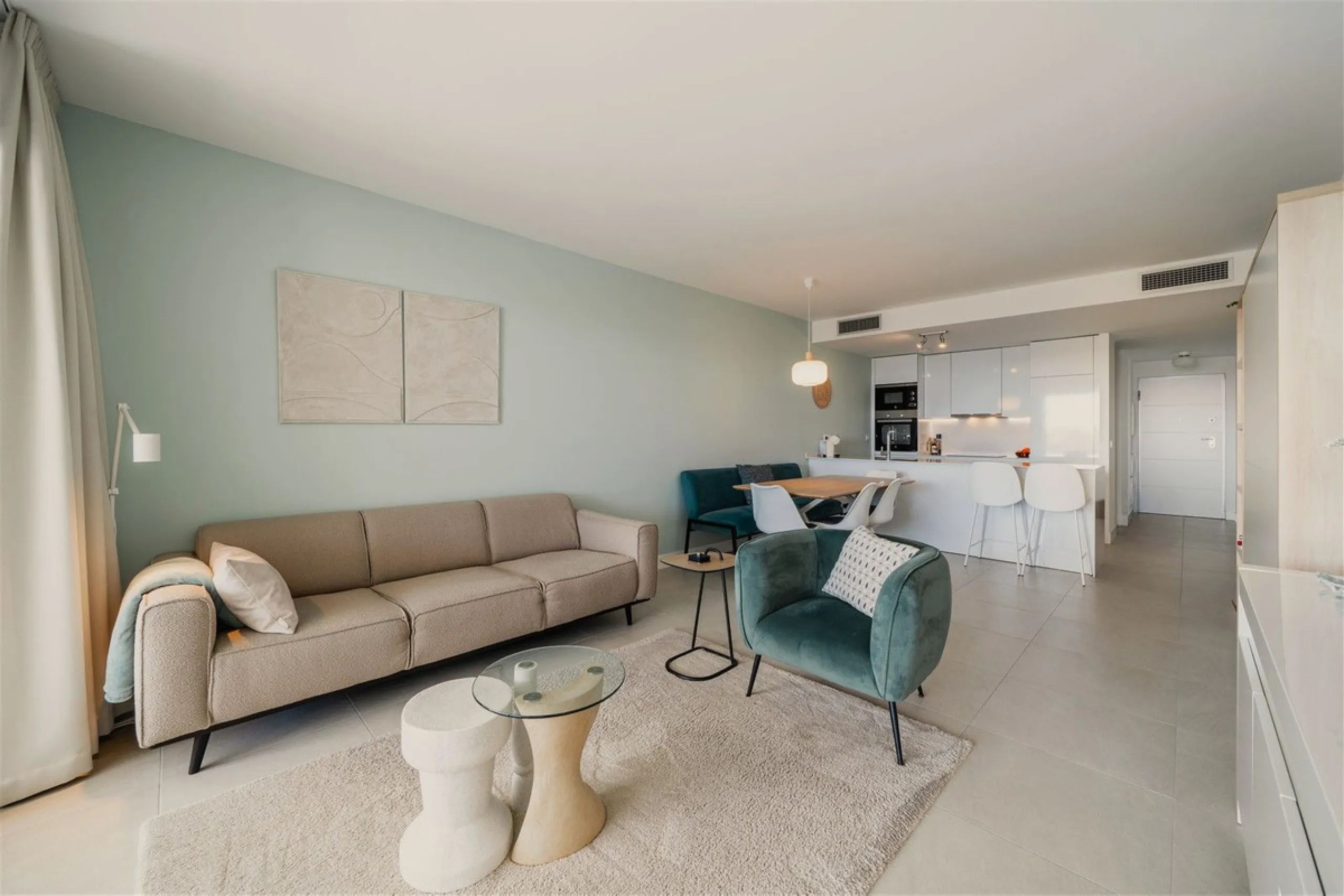 Beautiful 2 Bedroom elevated ground floor apartment with spacious terrace and sea views.