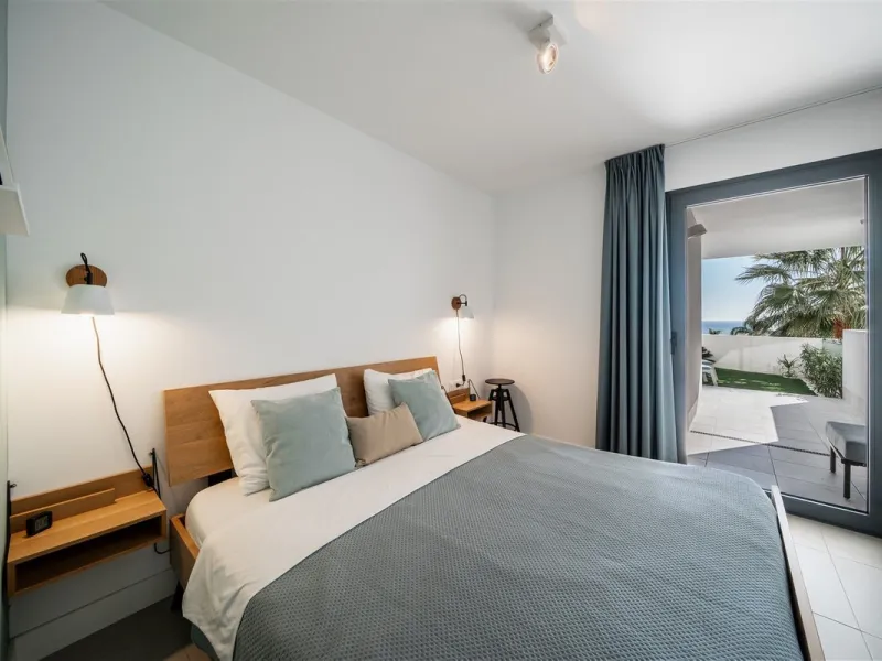 Beautiful 2 Bedroom elevated ground floor apartment with spacious terrace and sea views.
