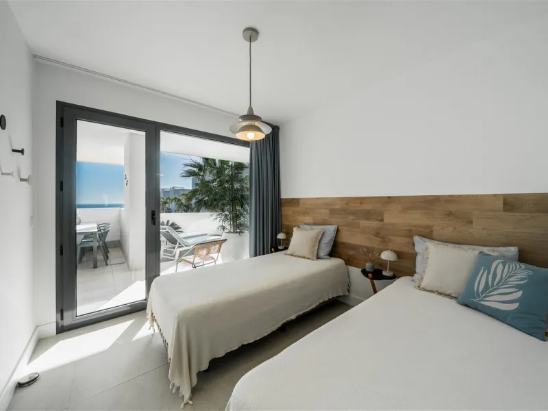 Beautiful 2 Bedroom elevated ground floor apartment with spacious terrace and sea views.
