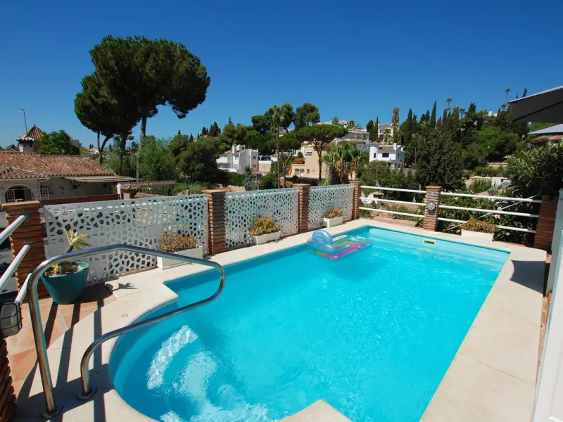 A large villa  in a quiet cul de sac in the Urbanisation of Campo Mijas with a large walled and gated garden with ample parking space for 3 or 4 cars . The property is entered via a gated entrance way to the large parking area with easy access to  the hou