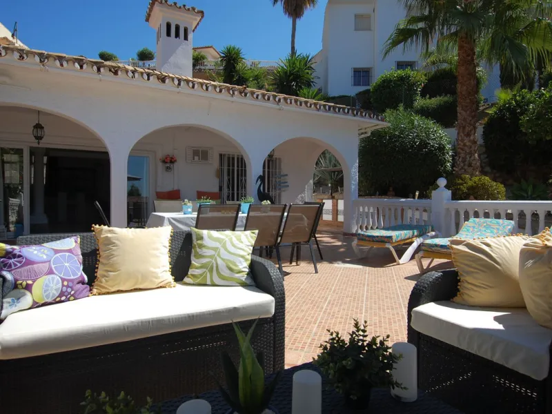 A large villa  in a quiet cul de sac in the Urbanisation of Campo Mijas with a large walled and gated garden with ample parking space for 3 or 4 cars . The property is entered via a gated entrance way to the large parking area with easy access to  the hou