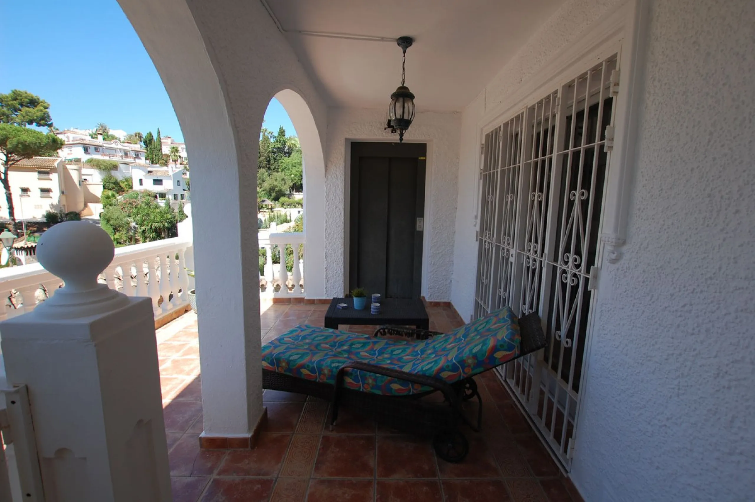 A large villa  in a quiet cul de sac in the Urbanisation of Campo Mijas with a large walled and gated garden with ample parking space for 3 or 4 cars . The property is entered via a gated entrance way to the large parking area with easy access to  the hou