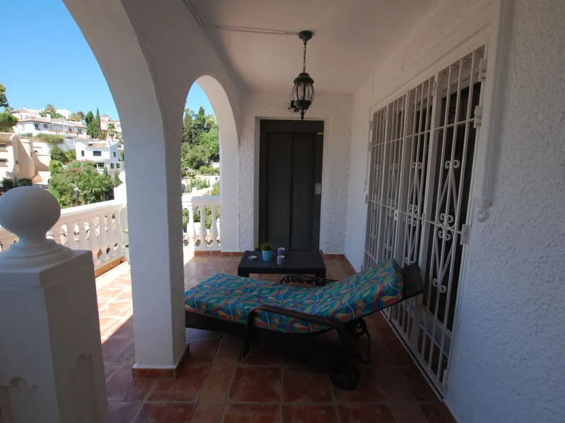 A large villa  in a quiet cul de sac in the Urbanisation of Campo Mijas with a large walled and gated garden with ample parking space for 3 or 4 cars . The property is entered via a gated entrance way to the large parking area with easy access to  the hou