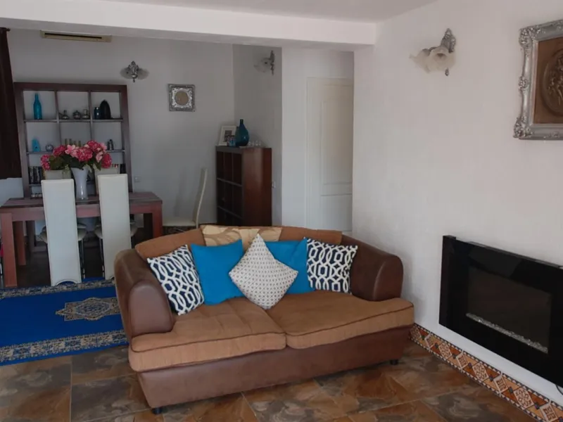 A large villa  in a quiet cul de sac in the Urbanisation of Campo Mijas with a large walled and gated garden with ample parking space for 3 or 4 cars . The property is entered via a gated entrance way to the large parking area with easy access to  the hou