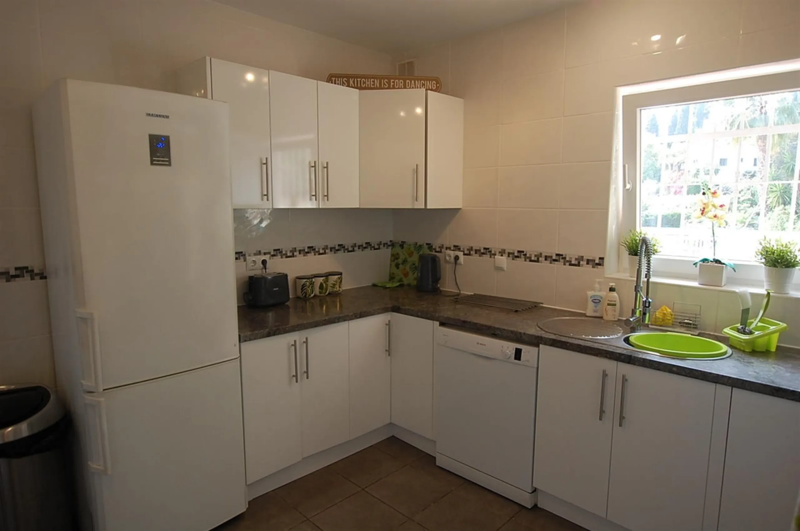 A large villa  in a quiet cul de sac in the Urbanisation of Campo Mijas with a large walled and gated garden with ample parking space for 3 or 4 cars . The property is entered via a gated entrance way to the large parking area with easy access to  the hou