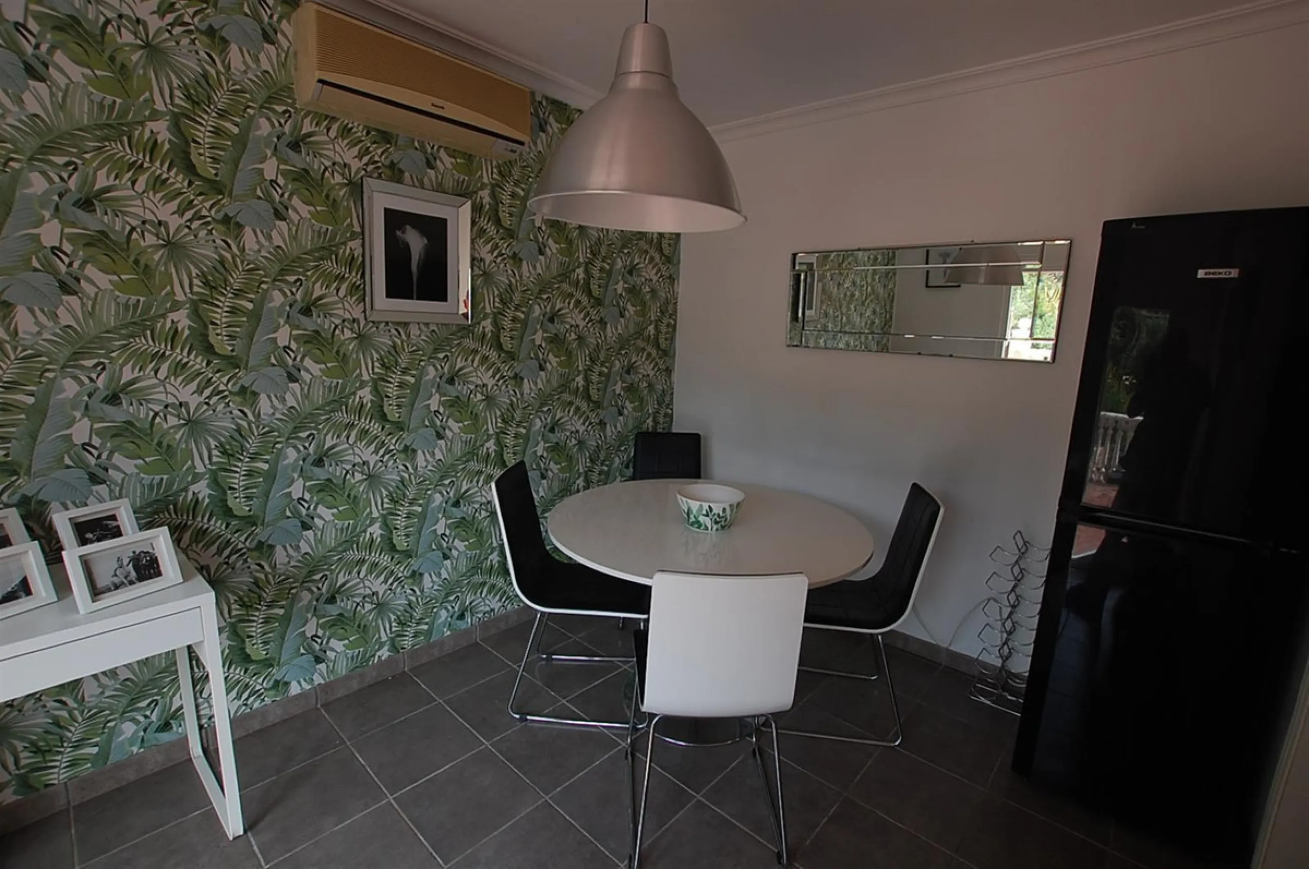 A large villa  in a quiet cul de sac in the Urbanisation of Campo Mijas with a large walled and gated garden with ample parking space for 3 or 4 cars . The property is entered via a gated entrance way to the large parking area with easy access to  the hou