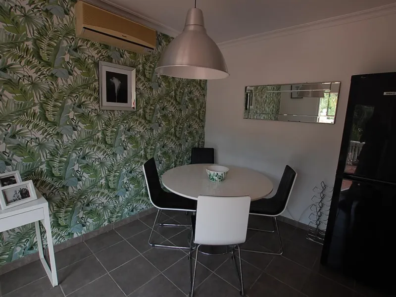 A large villa  in a quiet cul de sac in the Urbanisation of Campo Mijas with a large walled and gated garden with ample parking space for 3 or 4 cars . The property is entered via a gated entrance way to the large parking area with easy access to  the hou
