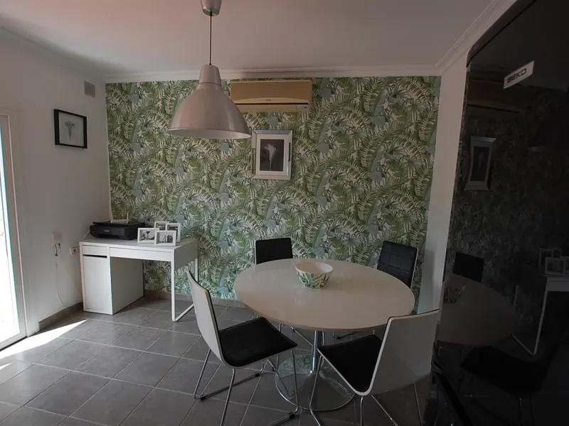 A large villa  in a quiet cul de sac in the Urbanisation of Campo Mijas with a large walled and gated garden with ample parking space for 3 or 4 cars . The property is entered via a gated entrance way to the large parking area with easy access to  the hou