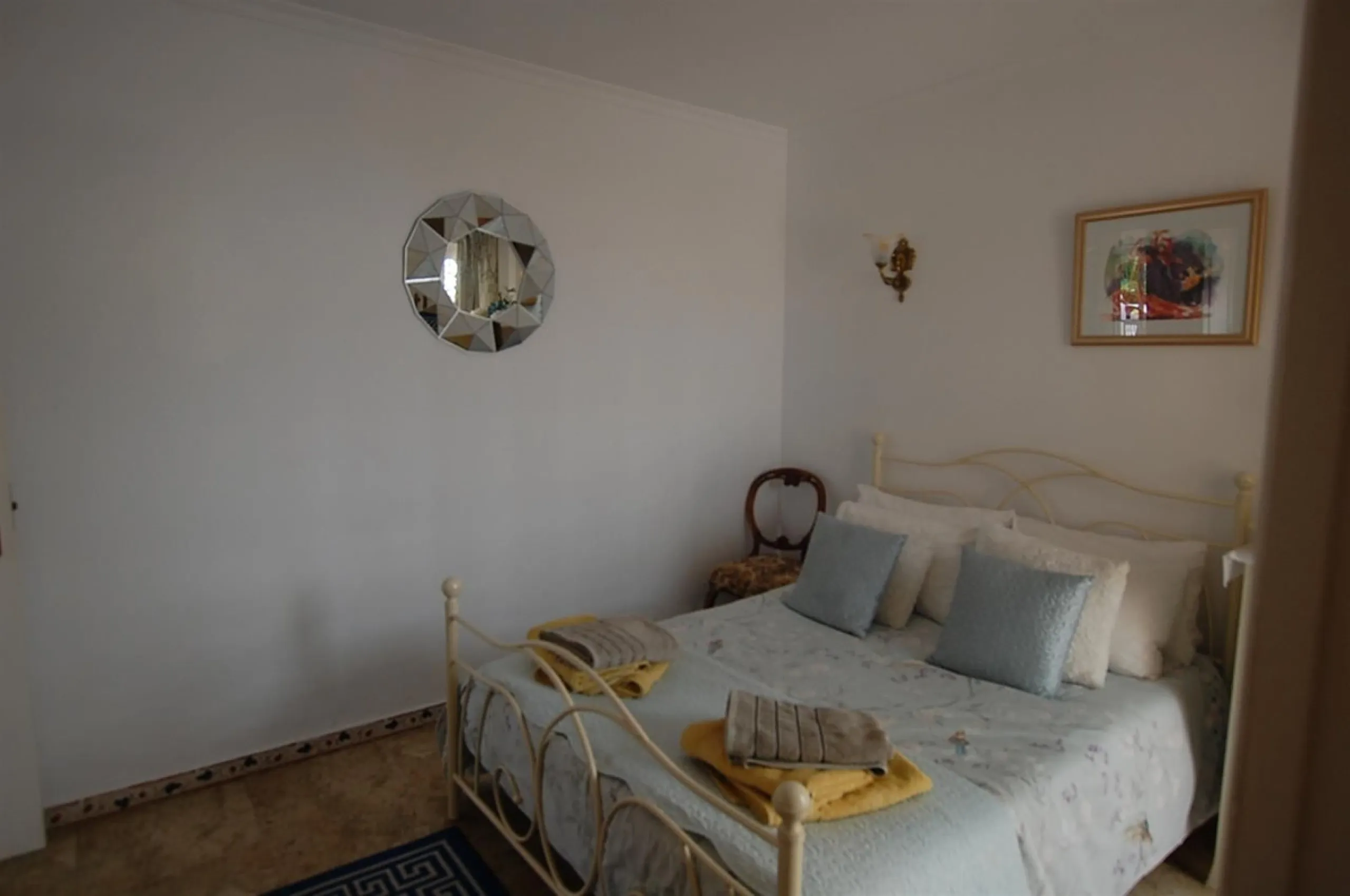 A large villa  in a quiet cul de sac in the Urbanisation of Campo Mijas with a large walled and gated garden with ample parking space for 3 or 4 cars . The property is entered via a gated entrance way to the large parking area with easy access to  the hou