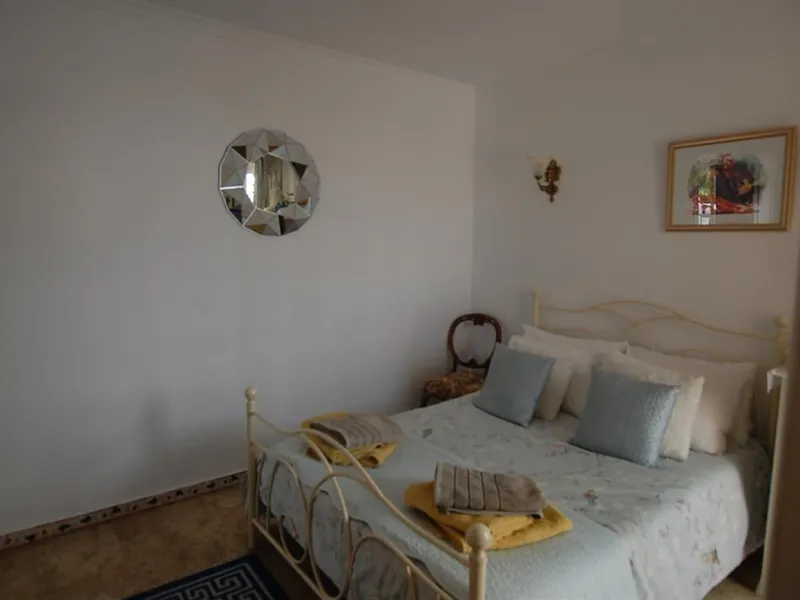A large villa  in a quiet cul de sac in the Urbanisation of Campo Mijas with a large walled and gated garden with ample parking space for 3 or 4 cars . The property is entered via a gated entrance way to the large parking area with easy access to  the hou