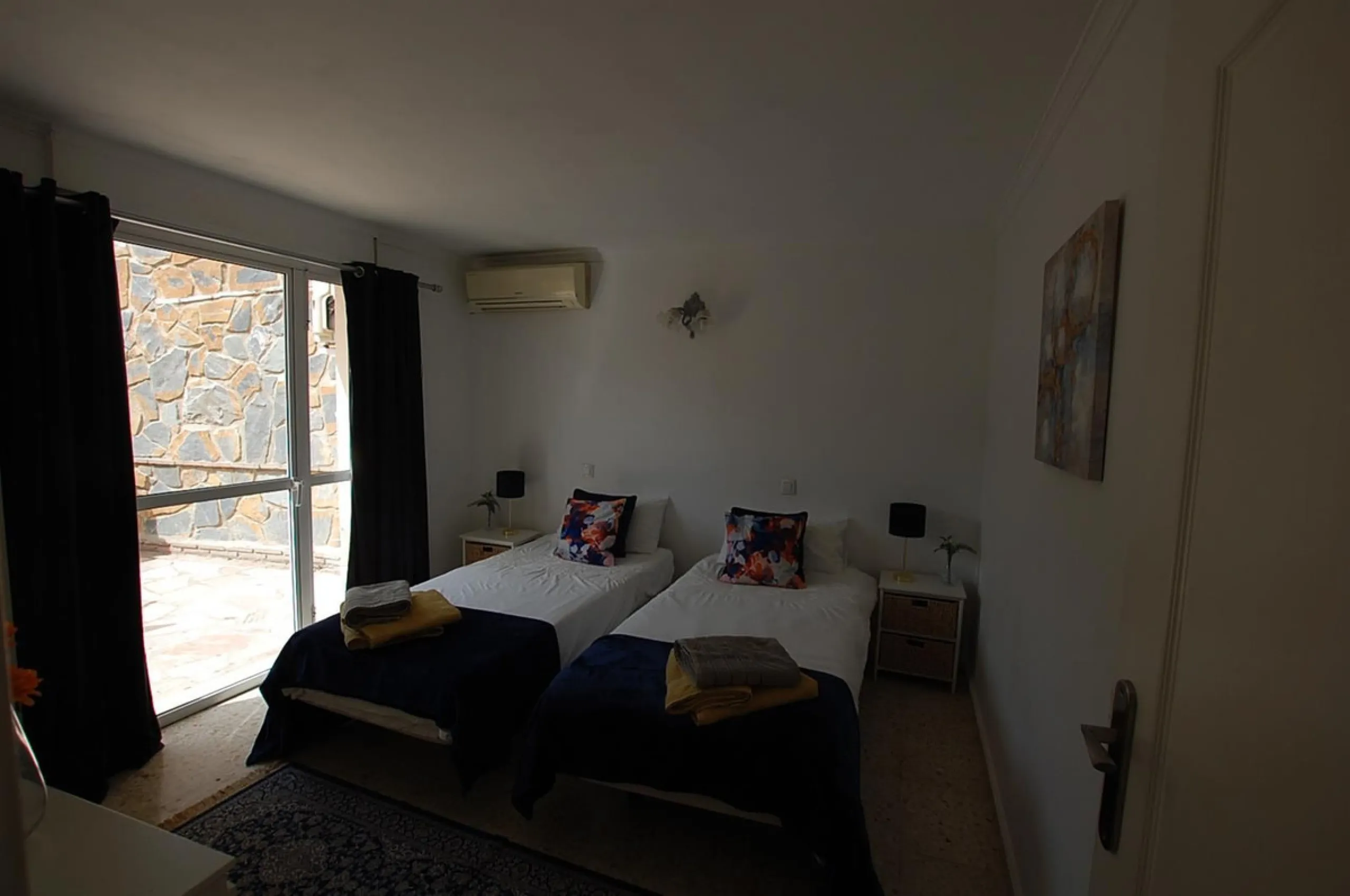 A large villa  in a quiet cul de sac in the Urbanisation of Campo Mijas with a large walled and gated garden with ample parking space for 3 or 4 cars . The property is entered via a gated entrance way to the large parking area with easy access to  the hou