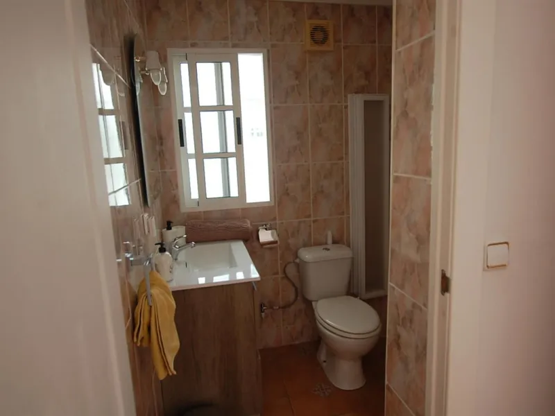 A large villa  in a quiet cul de sac in the Urbanisation of Campo Mijas with a large walled and gated garden with ample parking space for 3 or 4 cars . The property is entered via a gated entrance way to the large parking area with easy access to  the hou