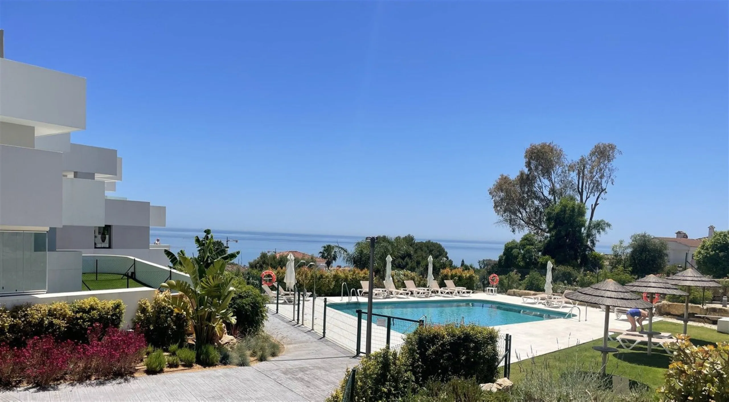Beautiful 2 Bedroom elevated ground floor apartment with spacious terrace and sea views.
