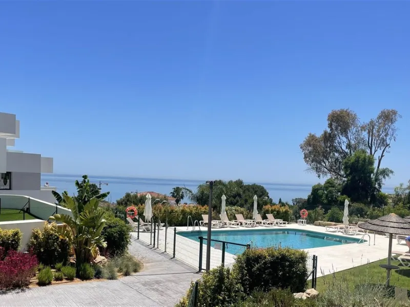 Beautiful 2 Bedroom elevated ground floor apartment with spacious terrace and sea views.