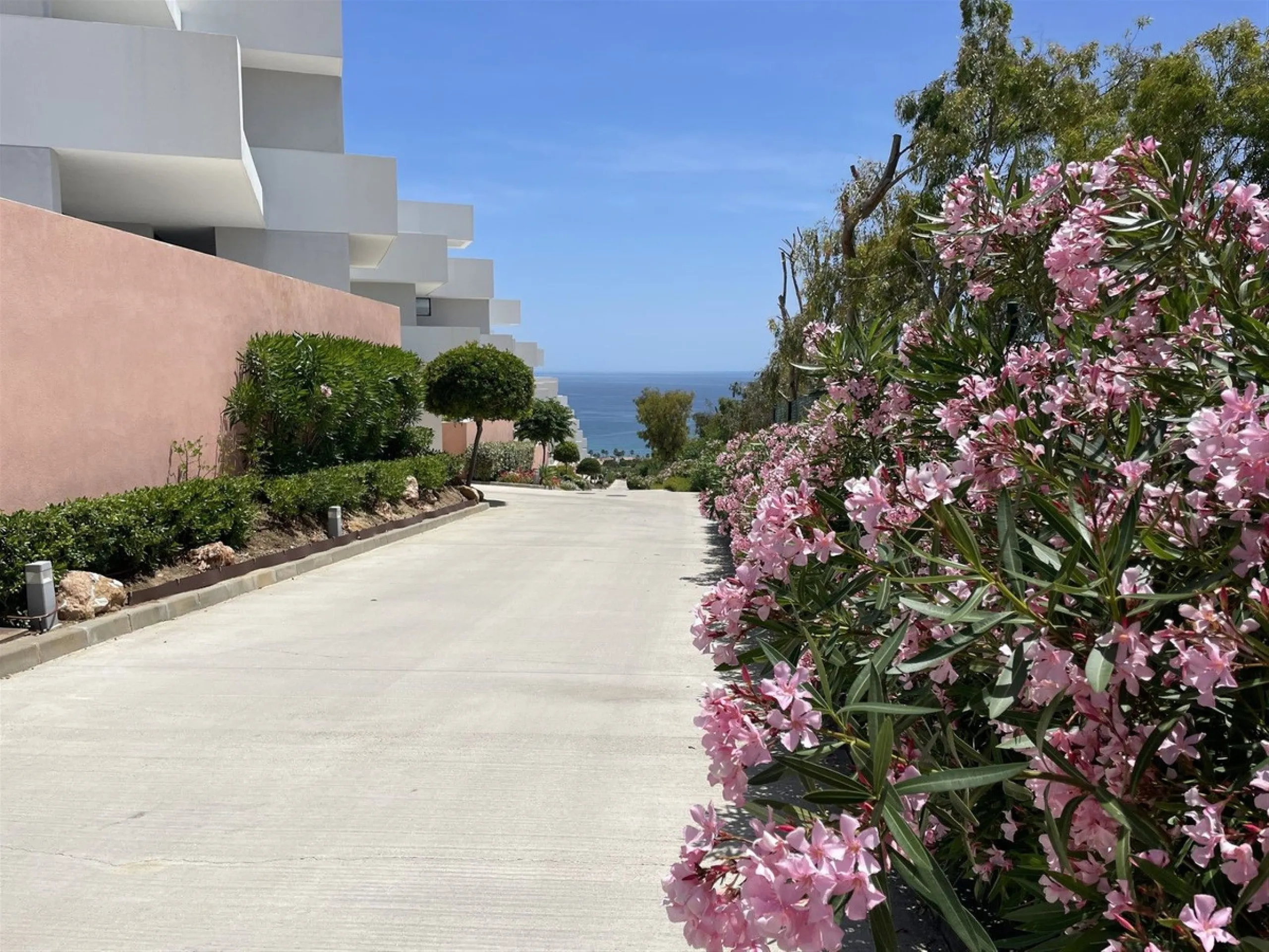 Beautiful 2 Bedroom elevated ground floor apartment with spacious terrace and sea views.