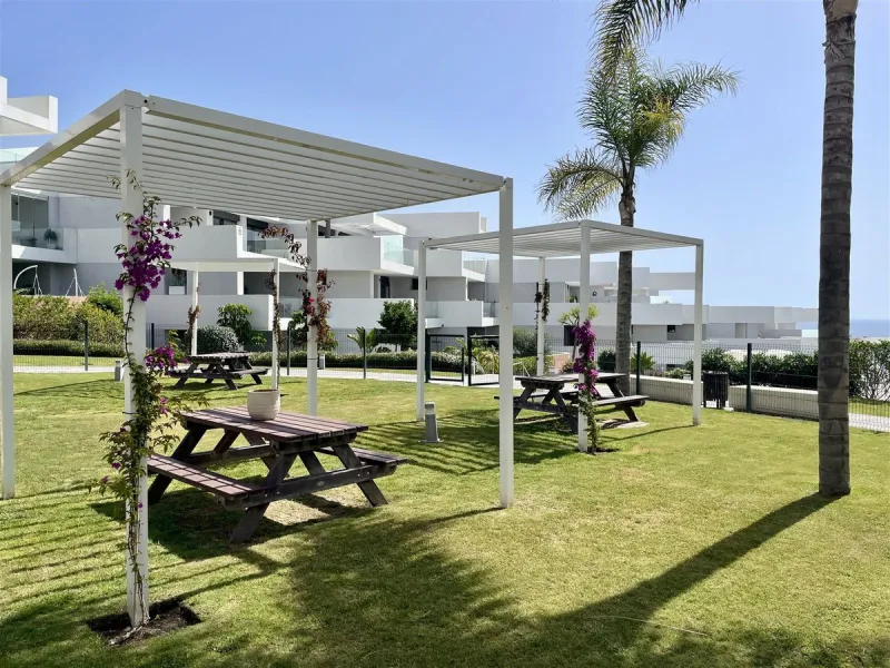 Beautiful 2 Bedroom elevated ground floor apartment with spacious terrace and sea views.