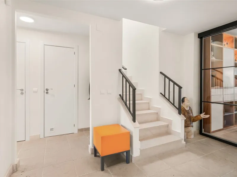 Exceptional panoramic duplex penthouse is located in the prestigious Los Flamingos Golf Resort and offers four bedrooms and two and a half bathrooms, beautifully presented in a refined modern rustic style.