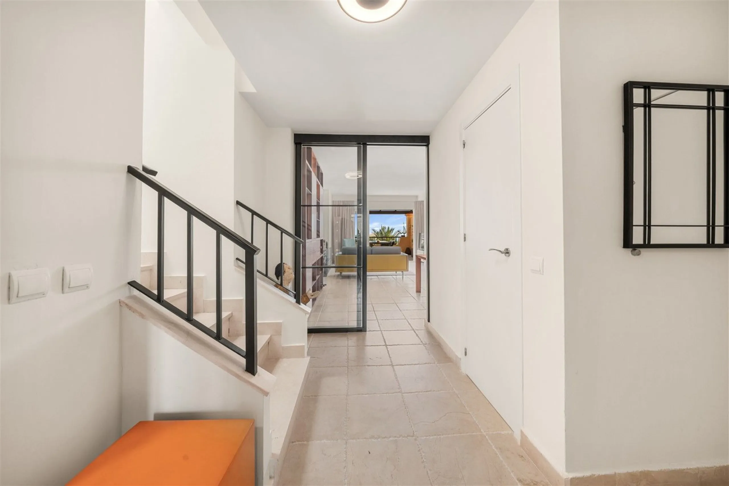 Exceptional panoramic duplex penthouse is located in the prestigious Los Flamingos Golf Resort and offers four bedrooms and two and a half bathrooms, beautifully presented in a refined modern rustic style.