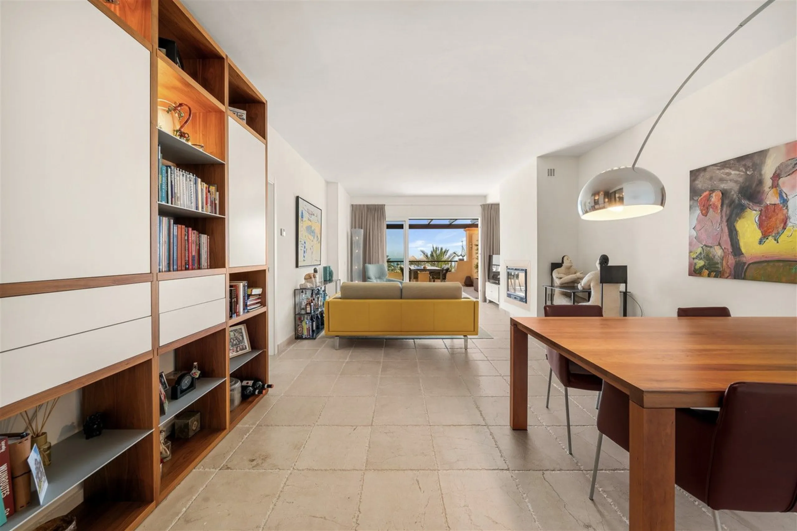 Exceptional panoramic duplex penthouse is located in the prestigious Los Flamingos Golf Resort and offers four bedrooms and two and a half bathrooms, beautifully presented in a refined modern rustic style.
