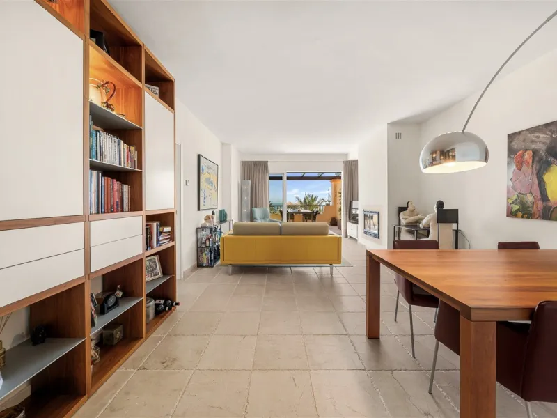 Exceptional panoramic duplex penthouse is located in the prestigious Los Flamingos Golf Resort and offers four bedrooms and two and a half bathrooms, beautifully presented in a refined modern rustic style.