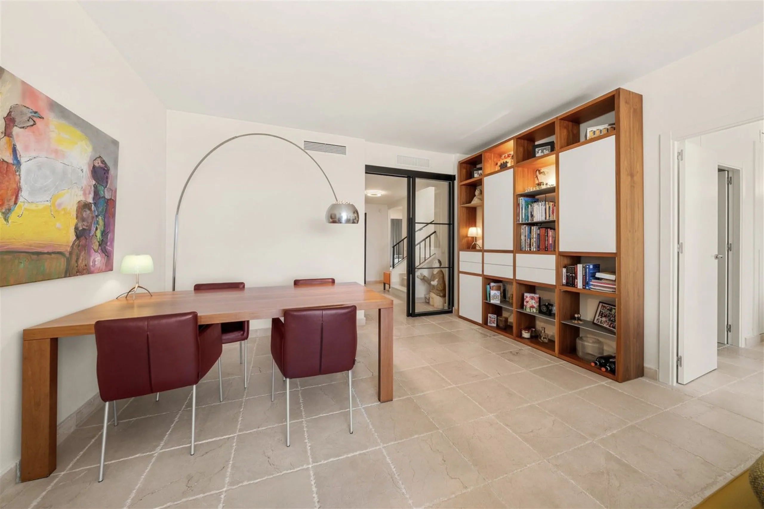 Exceptional panoramic duplex penthouse is located in the prestigious Los Flamingos Golf Resort and offers four bedrooms and two and a half bathrooms, beautifully presented in a refined modern rustic style.