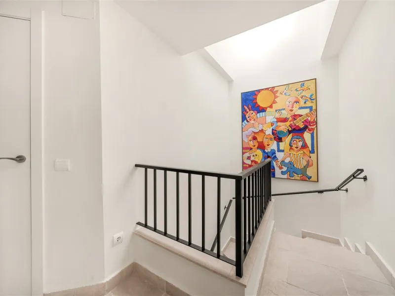 Exceptional panoramic duplex penthouse is located in the prestigious Los Flamingos Golf Resort and offers four bedrooms and two and a half bathrooms, beautifully presented in a refined modern rustic style.