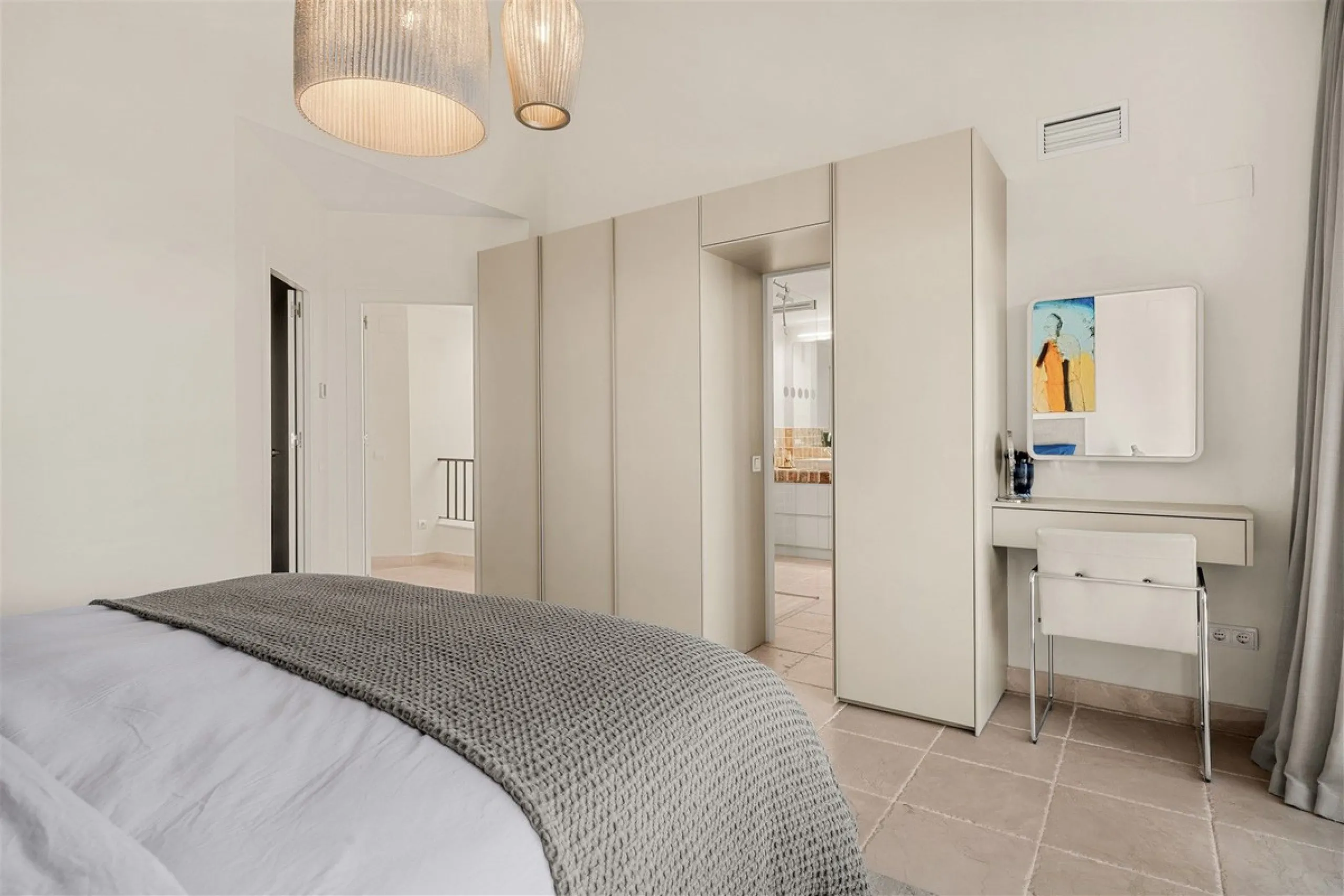 Exceptional panoramic duplex penthouse is located in the prestigious Los Flamingos Golf Resort and offers four bedrooms and two and a half bathrooms, beautifully presented in a refined modern rustic style.