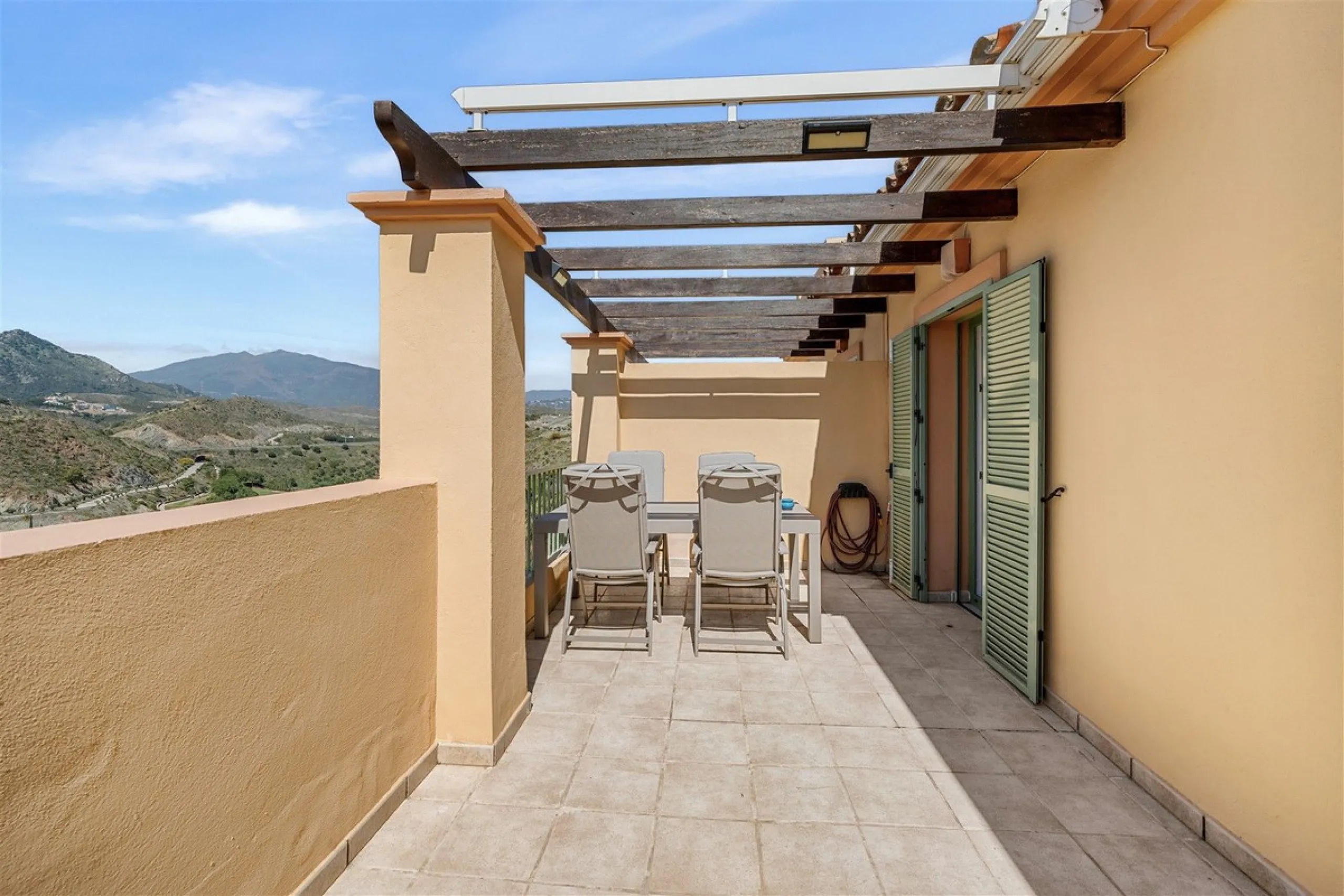 Exceptional panoramic duplex penthouse is located in the prestigious Los Flamingos Golf Resort and offers four bedrooms and two and a half bathrooms, beautifully presented in a refined modern rustic style.