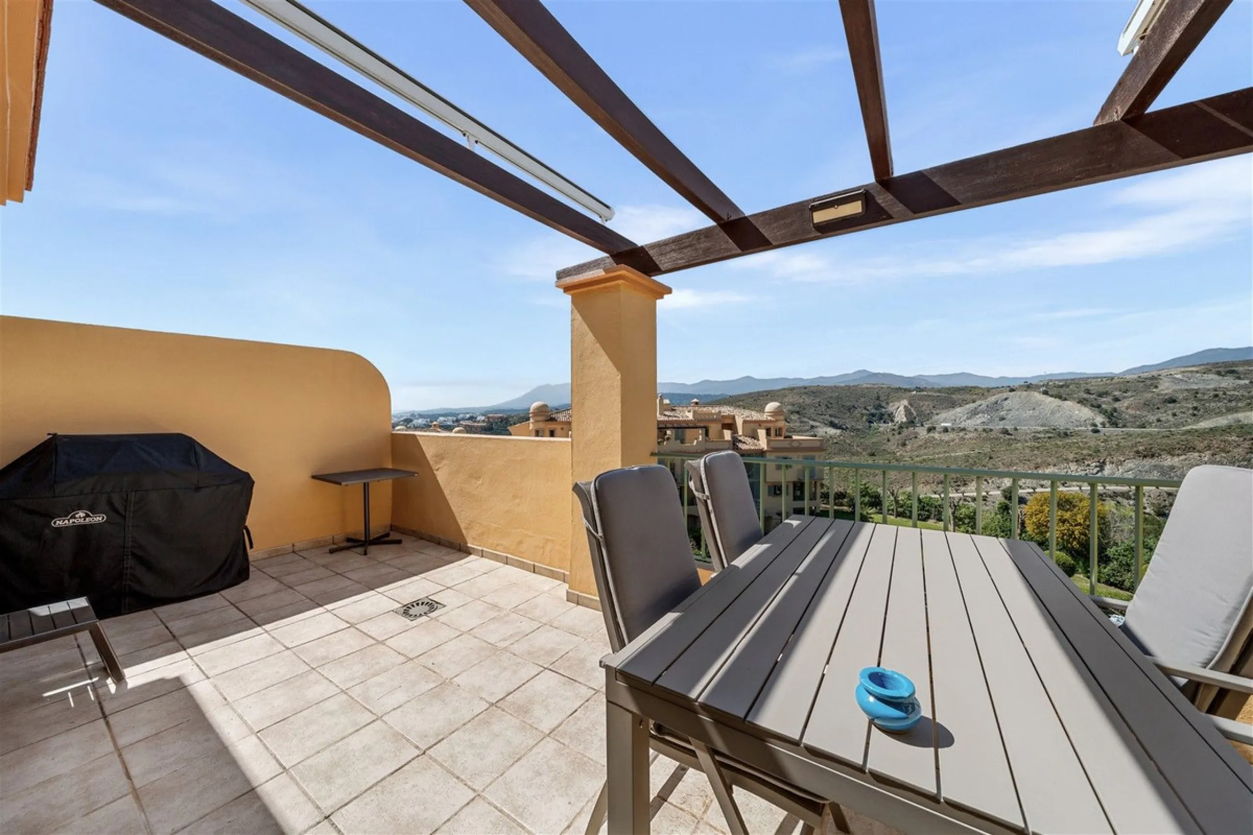 Exceptional panoramic duplex penthouse is located in the prestigious Los Flamingos Golf Resort and offers four bedrooms and two and a half bathrooms, beautifully presented in a refined modern rustic style.