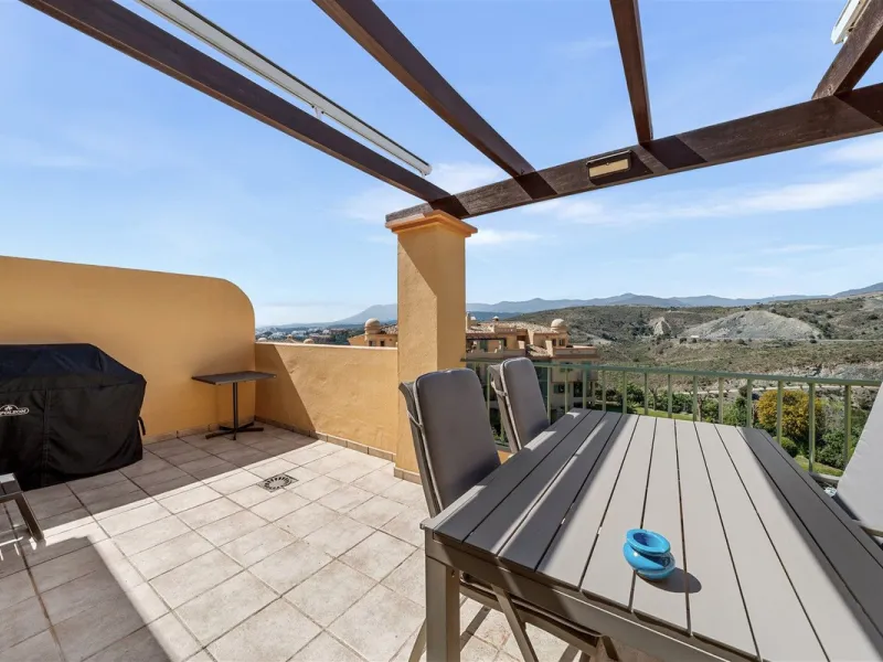 Exceptional panoramic duplex penthouse is located in the prestigious Los Flamingos Golf Resort and offers four bedrooms and two and a half bathrooms, beautifully presented in a refined modern rustic style.