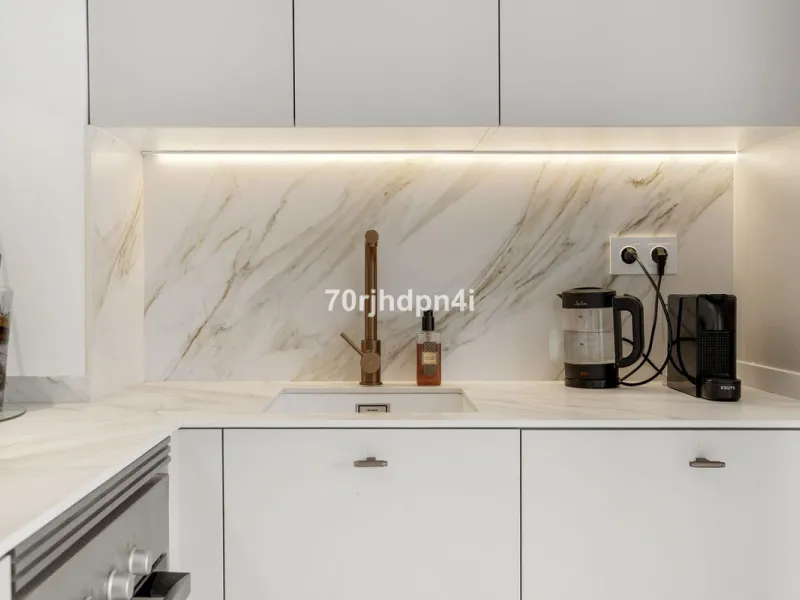Fully Renovated Ground Floor Apartment in a Prime Location in Nueva Andalucía