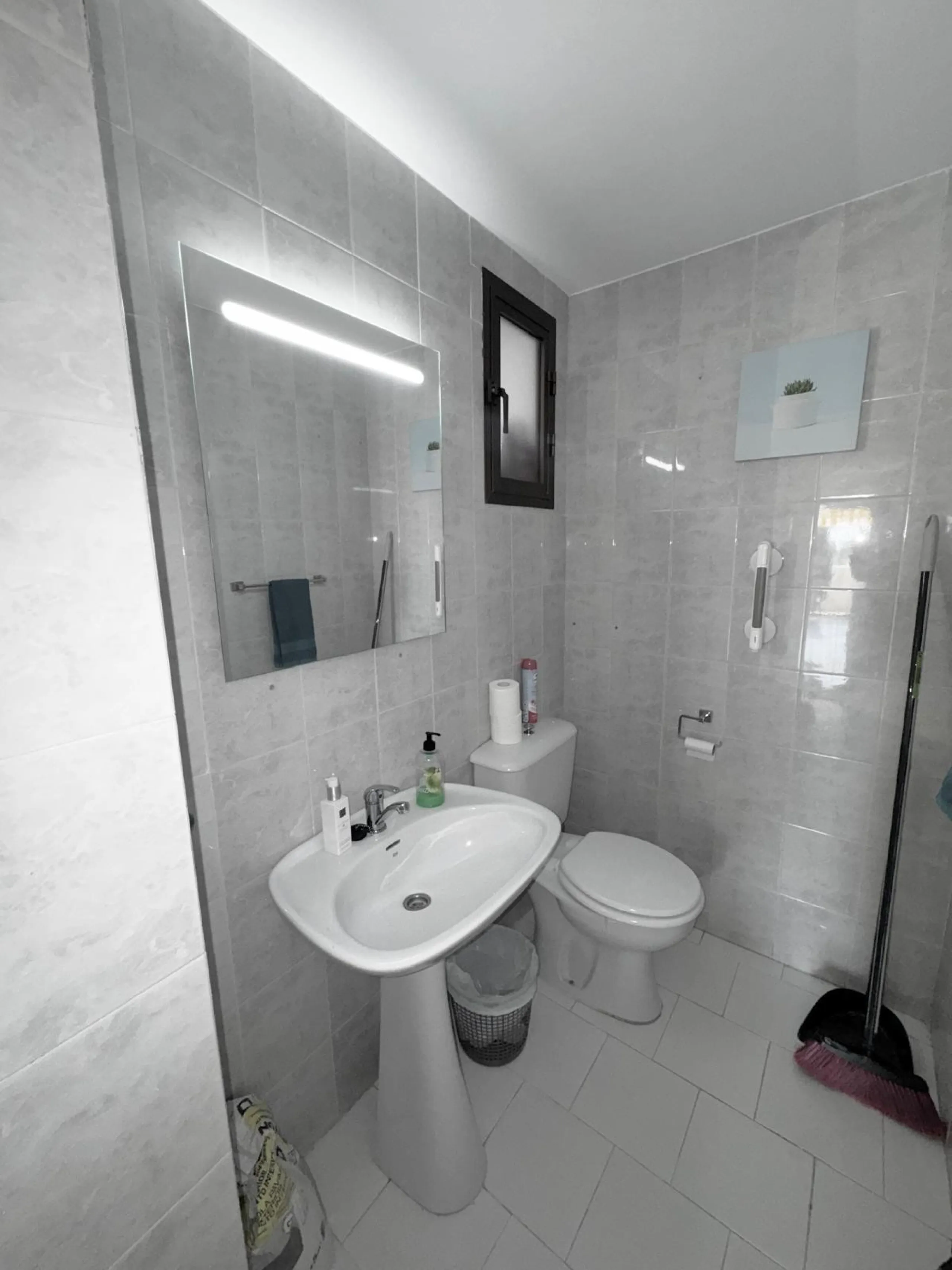 This fantastic two-bedroom, southwest-facing first-floor apartment in Calahonda offers beautiful sea views and an abundance of natural light throughout the day. The property features a bright and spacious living area complete with a charming fireplace, cr