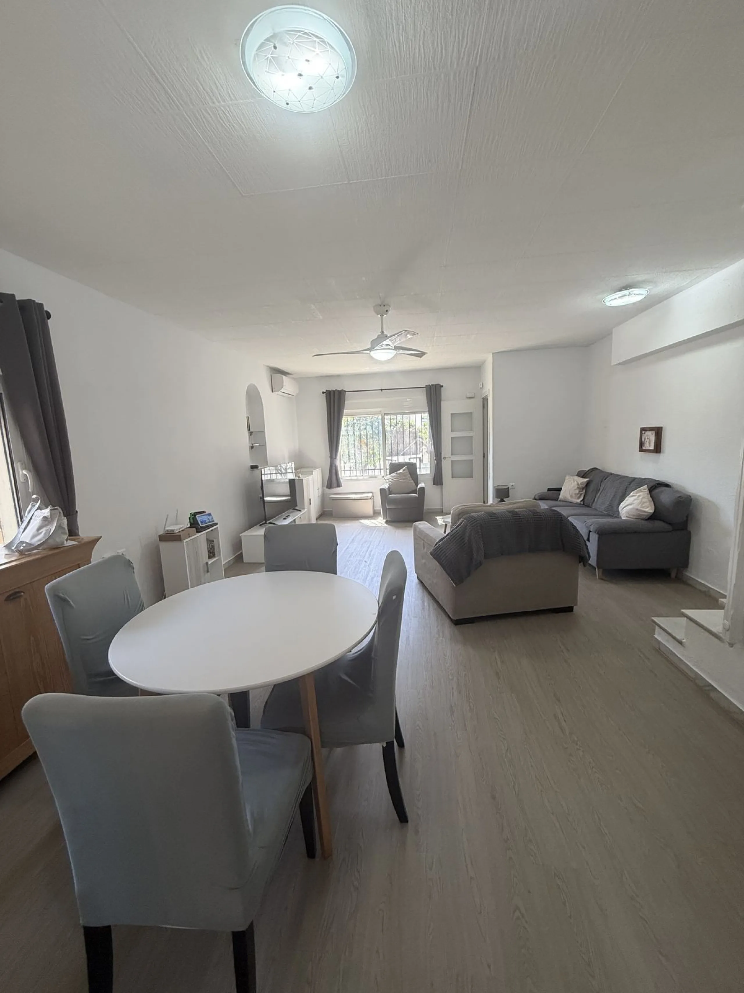 Semi Detached house lower Calahonda. In a small community of 15 houses with communal pool and garden. On the lower level there is a good size lounge, large fitted kitchen, a small bathroom and access to the private terrace and garden that wraps around thr